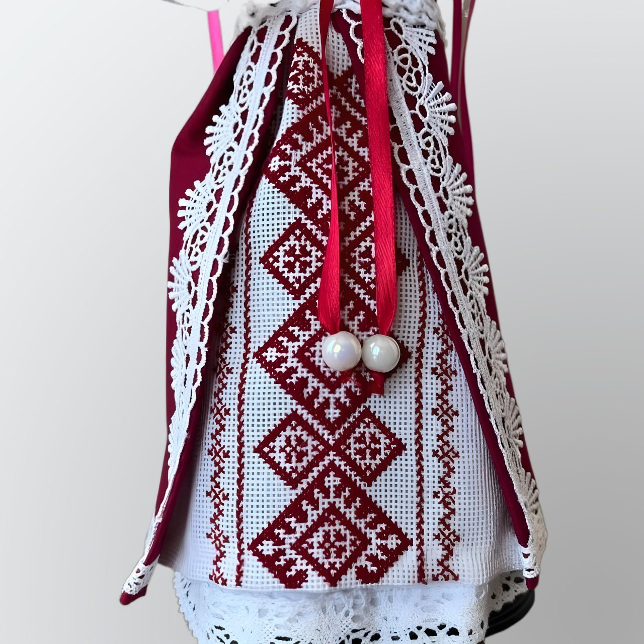 Ukrainian folk doll with vibrant red and white hand-stitching | Gift-Emporium