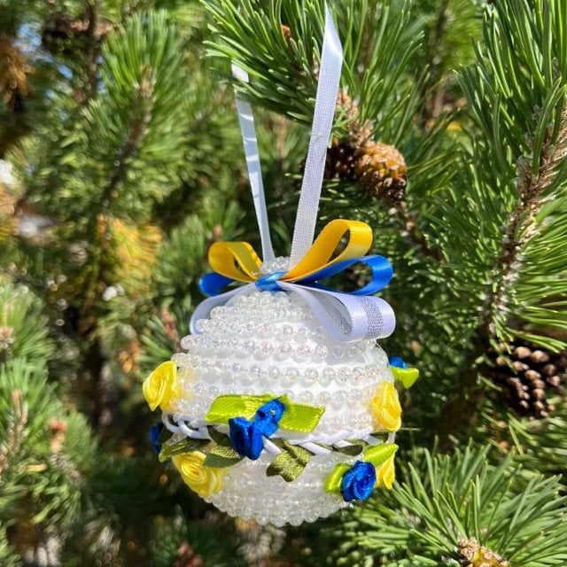 Colorful flower-adorned Christmas bead ornaments, perfect holiday gift | Gift-Emporium