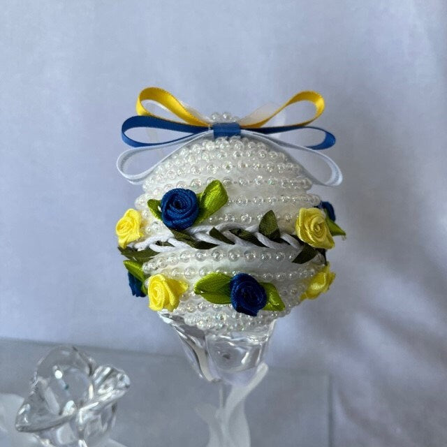 Four hand-crafted Christmas bead balls decorated with colorful flowers
| Gift-Emporium