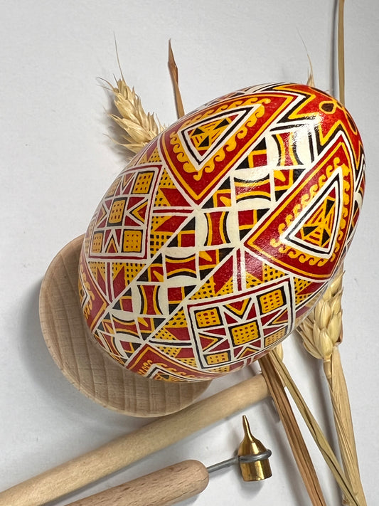 Traditional Ukrainian Pysanka in Red and Orange Goose Shell