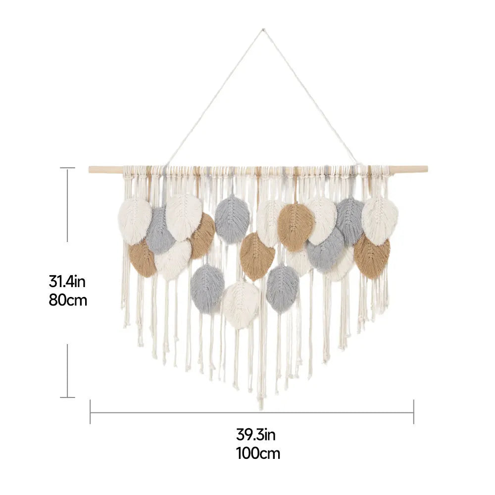 Intricate leaf tapestry wall decor with fringed tassels, neutral tones