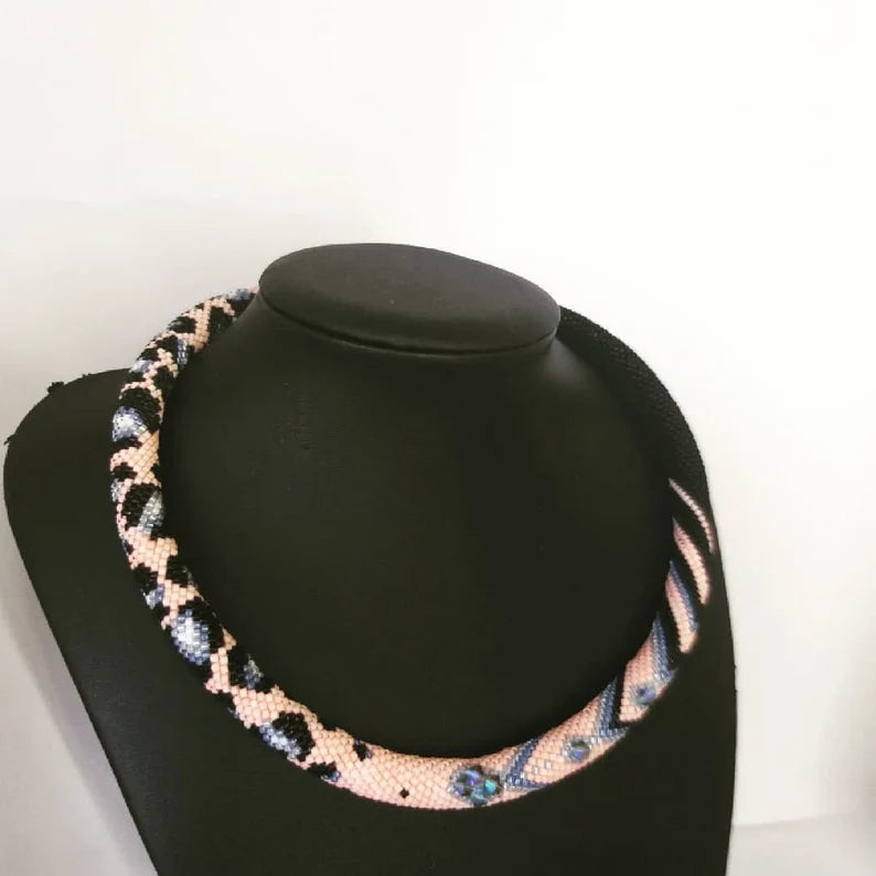 Handmade pink and grey beaded necklace featuring elegant Japanese beads, perfect for gifts.