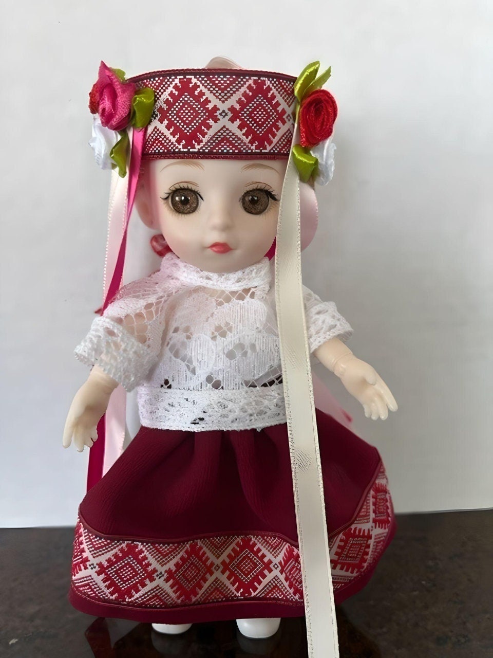 Doll art featuring Ukrainian embroidery and flower embellishments | Gift-Emporium
