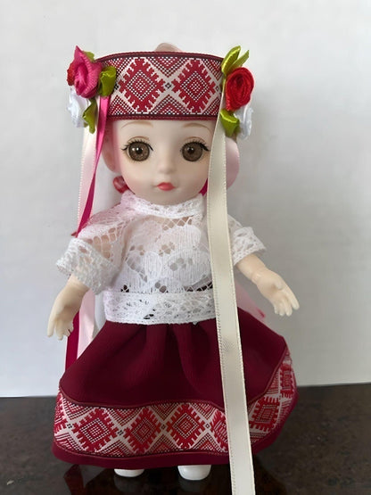 Doll art featuring Ukrainian embroidery and flower embellishments | Gift-Emporium
