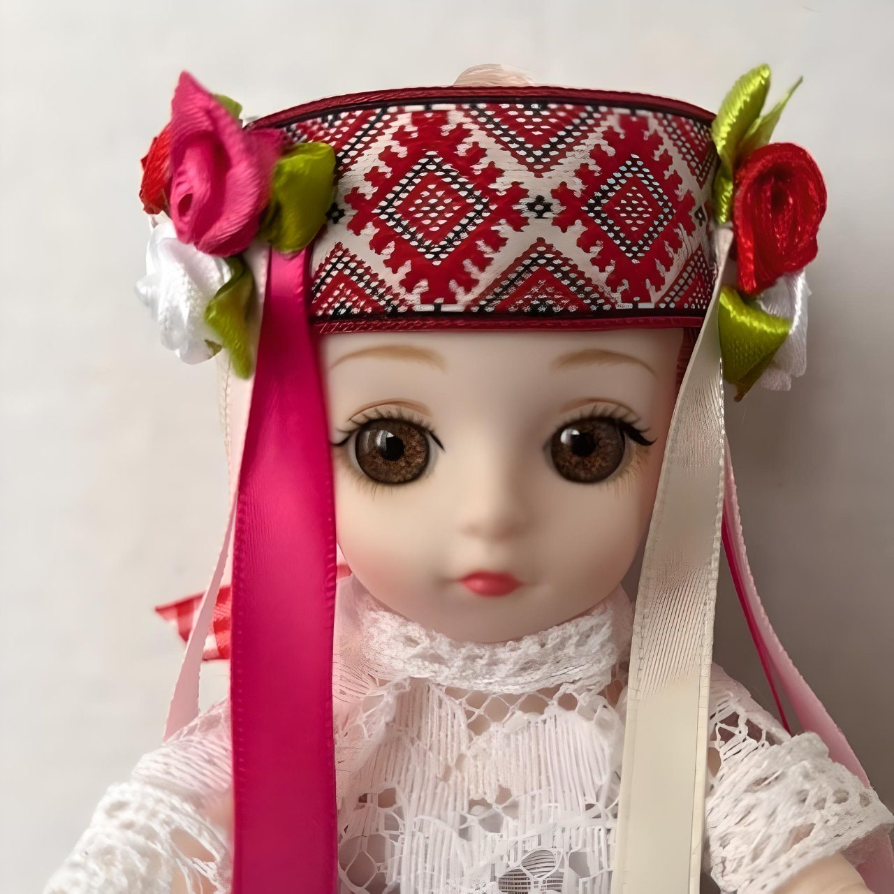 Unique red and white doll gift with flowers and ribbons | Gift-Emporium
