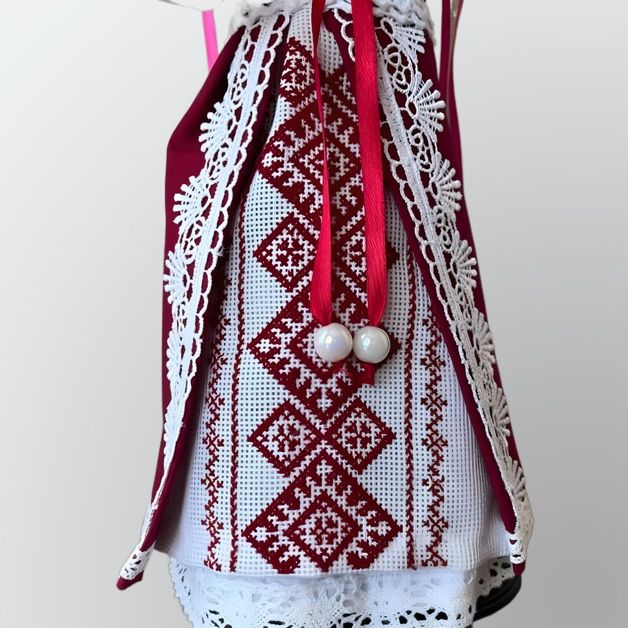 Ukrainian folk doll with vibrant red and white hand-stitching | Gift-Emporium
 