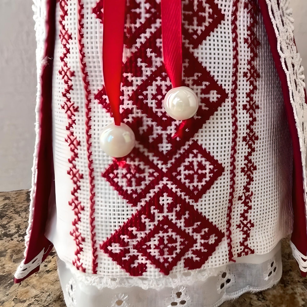 Handmade Motanka doll with white fabric and red stitching | Gift-Emporium