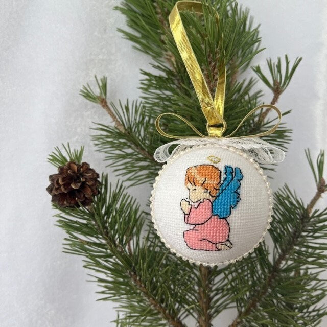 Magenta angel ornament with elegant cross-stitch detailing for Christmas | Gift-Emporium