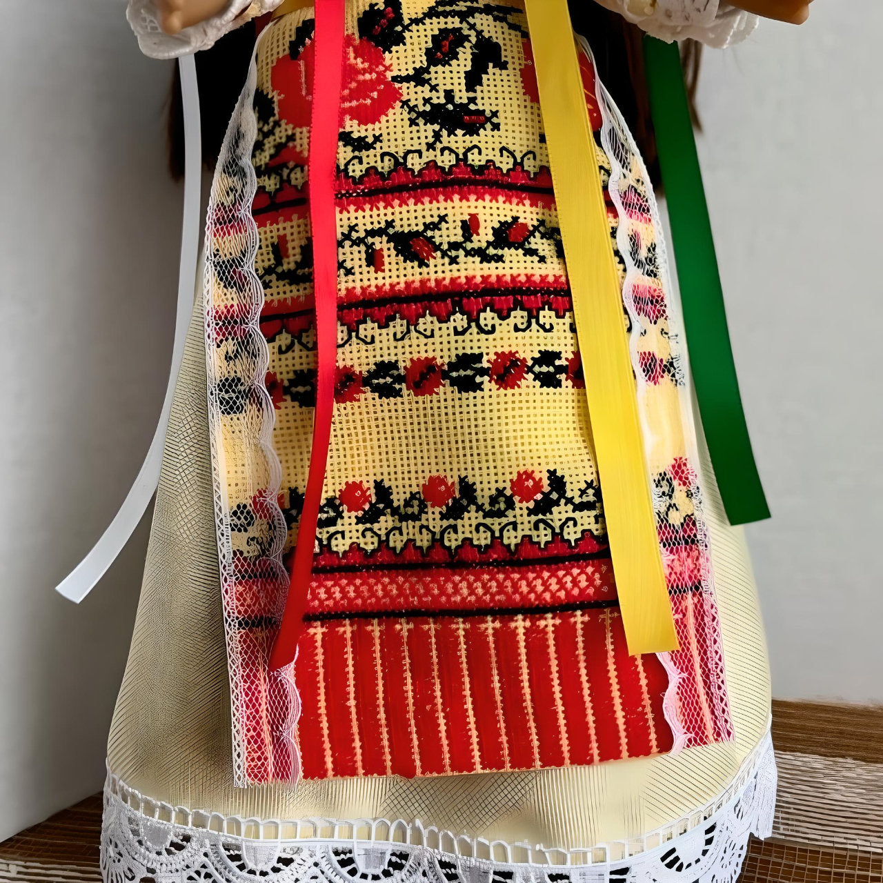 Close-up of red and yellow hand-stitched "Lesya" Doll | Gift-Emporium