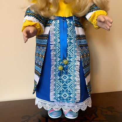 Bright Ukrainian doll with embroidered clothing, wreath, and pearl necklace | Gift-Emporium