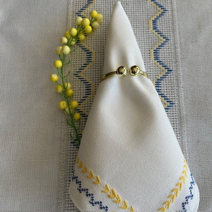 Vibrant blue and yellow linen napkins with delicate embroidery | Gift-Emporium