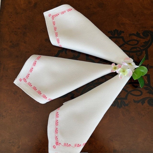 White machine-embroidered napkins with rose design, perfect for formal dining | Gift-Emporium