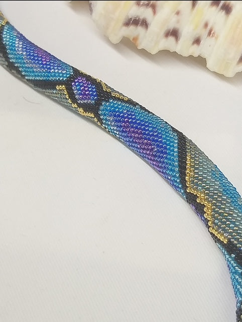 Handcrafted blue beads in snake design, a perfect summer gift | Gift-Emporium