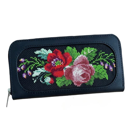 Ukrainian leather wallet with red and black backdrop, featuring traditional hand-embroidered flowers | Gift-Emporium